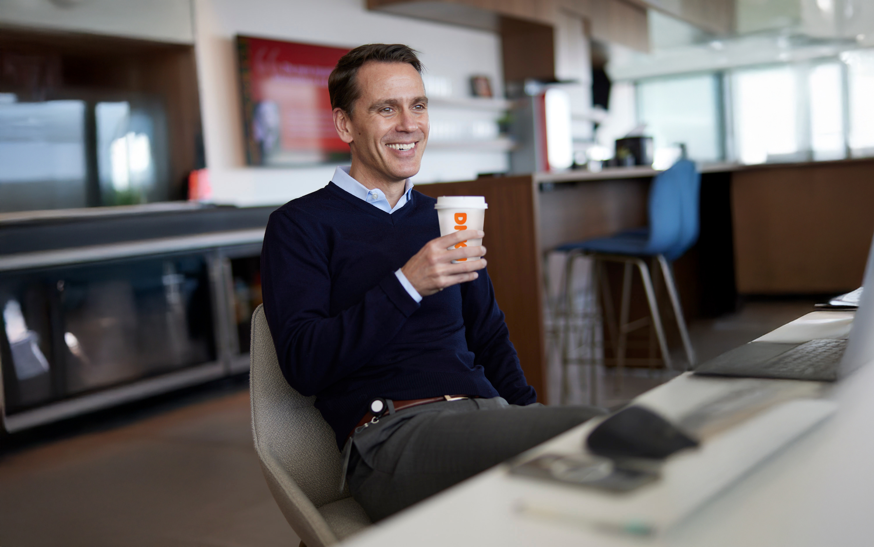 Erik Morris Drinking Dunkin' Coffee